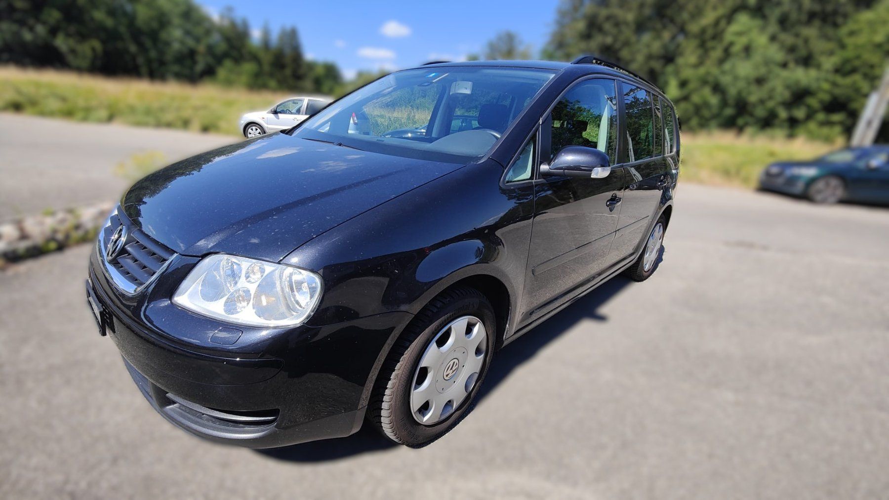 VW Autos: VW Touran 2.0 FSI – D'occasion à Lyssach par garagegautschi06 1