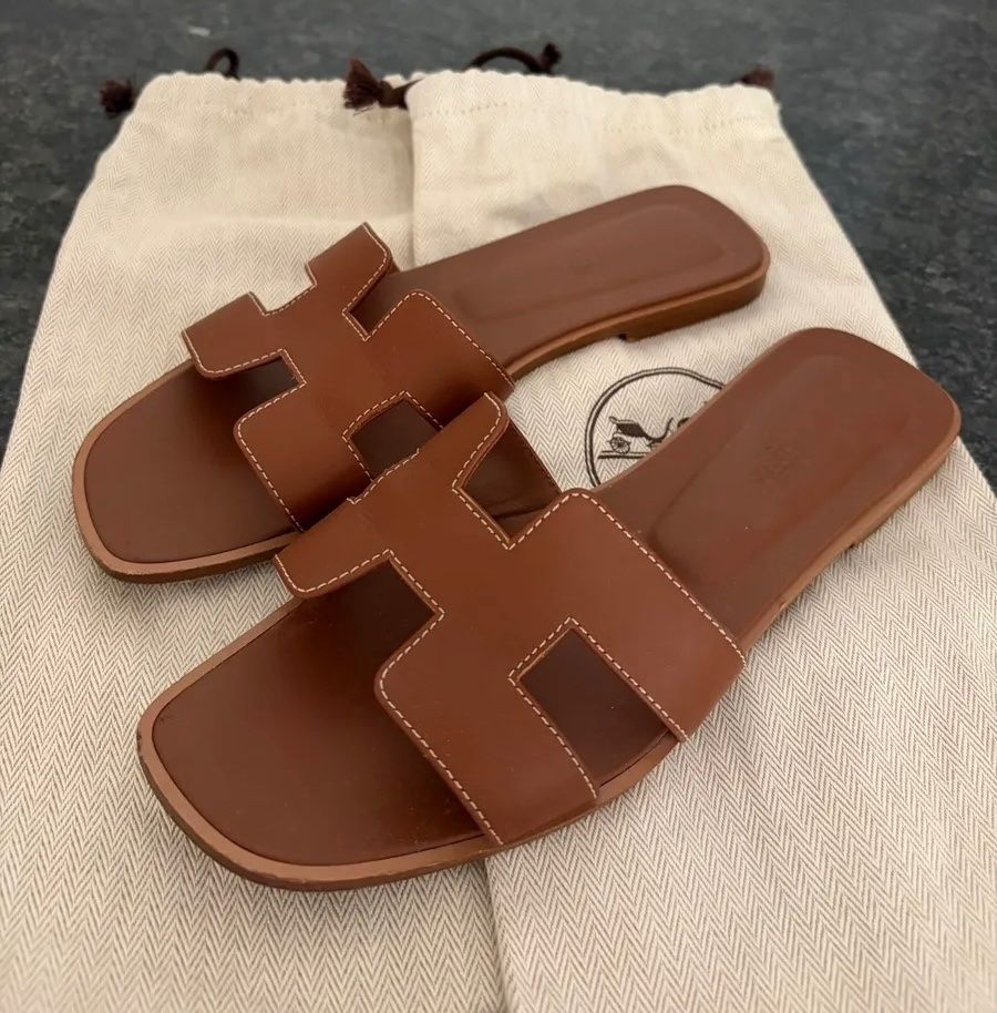 Hermès Damenschuhe: Hermès Oran Sandalen Gr. 38.5, braun – Neu (gemäss Beschreibung) aus Triesen von atos87