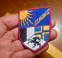 VINTAGE Badge ST. MORITZ STG STICKEREI sonne/wappen d-blau