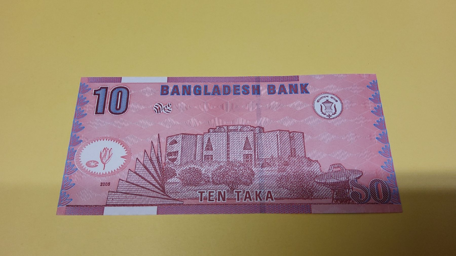 Banconote: Bangladesch 10 Taka 2005, Parlament, UNC – Nuovo e nell'imballaggio originale da Herisau venduto da Nluanalucas 1