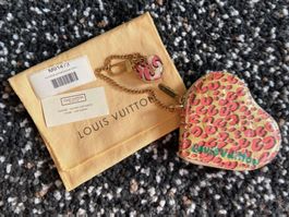 Louis Vuitton leopard coins bag