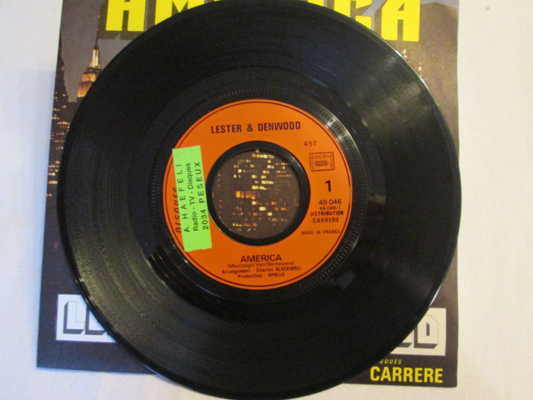 Vinyles: SINGLE "AMERICA" – D'occasion à La Chaux-de-Fonds par Marteaux 1