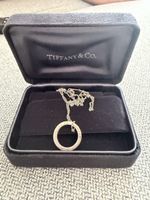 Tiffany & Co. silver necklace with ring pendant and box