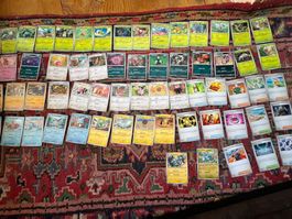 Pokémon Sammelkarten ca 100, keine ist Doppelt Starterpacket