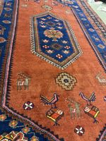 Perserteppich mit Ornamenten und Tiermotiven gute Zustand