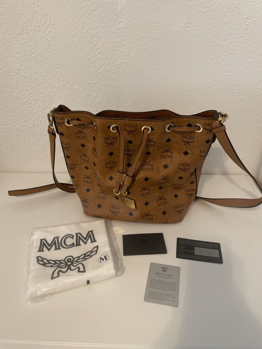 Mcm Borse da donna: MCM Beuteltasche braun Logo Muster gebraucht – Usato da Holderbank AG venduto da Hallo104 9