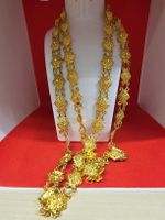 kette mit Blumen und Kristallen 