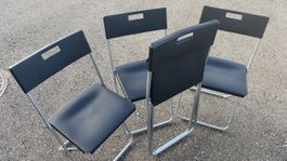 4 Klappstühle