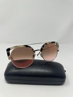 Sonnenbrille mit Roségold-Rahmen und braunem Muster
