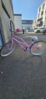 Bicicletta cruiser rosa in buono stato di utilizzo