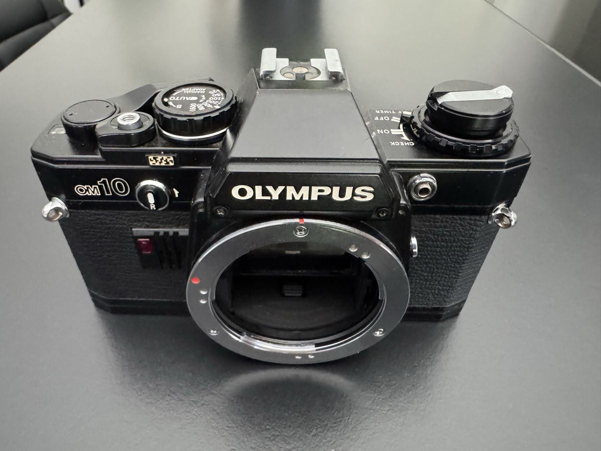Olympus Fotocamera: Olympus OM10 black – Difettoso da Bramois venduto da Cornalin357