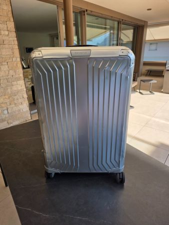 Valise Samsonite rigide argentée état d'occasion