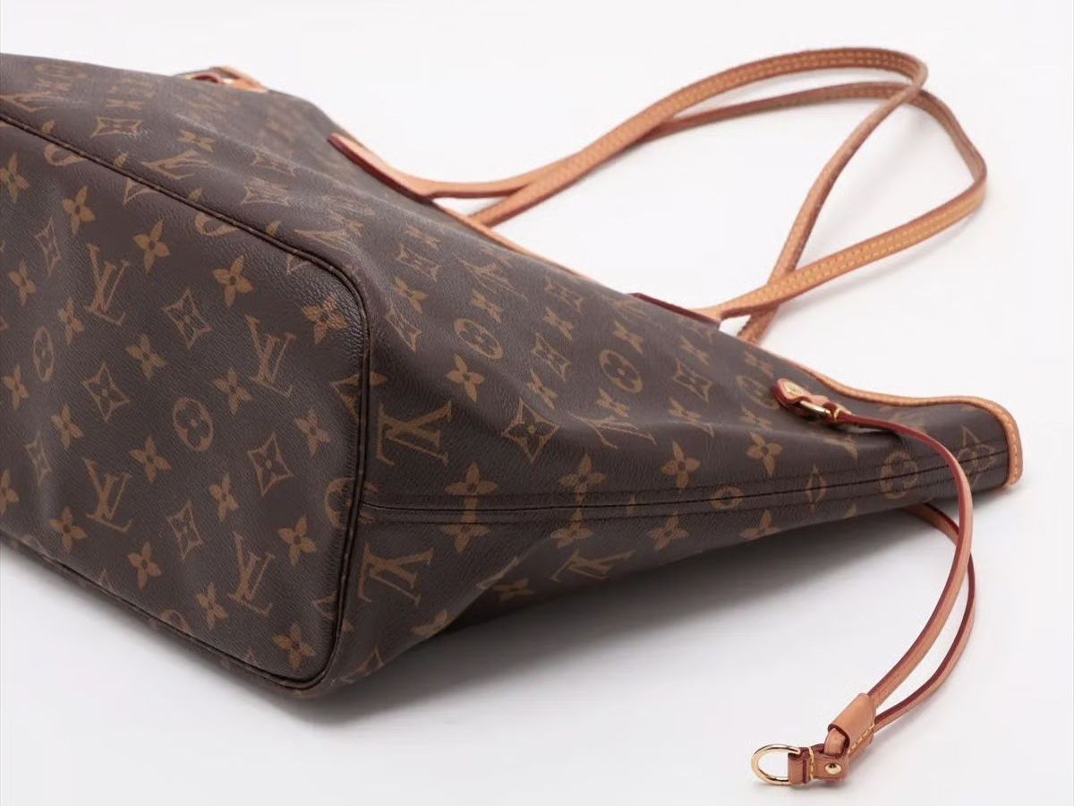 Louis Vuitton Borse da donna: Louis Vuitton Neverfull MM Monogram mit Pouch – Usato da Flawil venduto da HeritageAtelier 2
