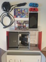 Nintendo Switch Konsole mit Spielen und Zubehoer