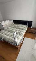 Doppelbett 160 × 200 cm mit gepolstertem Kopfteil aus Leder