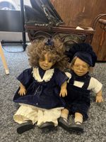 Antiker Puppenwagen mit 2 Puppen