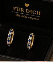 Creolen 333 Gold mit 20 Zirkonia blau weiß