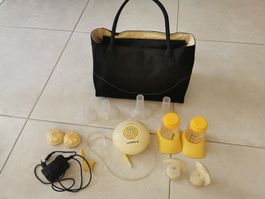 Medela Swing Maxi Milchpumpe mit Tasche und 2 Calma Sauger