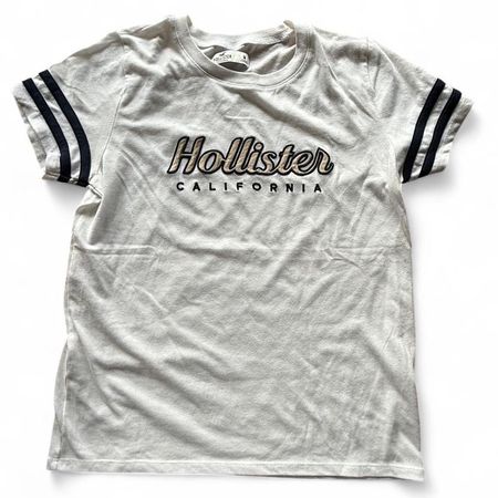 Hollister white and black striped tee, size M