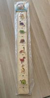 Jolie toise en bois pour enfants
