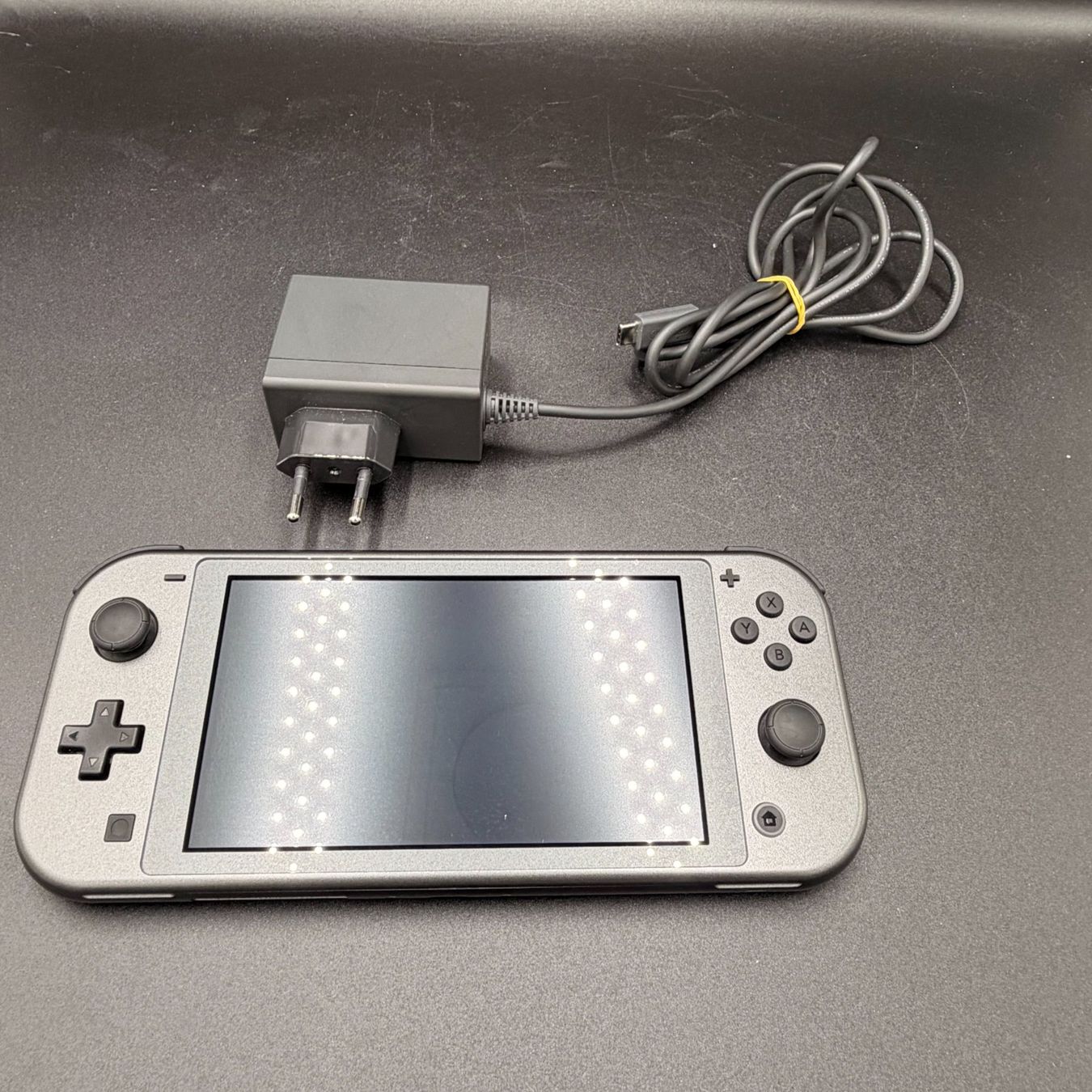 Nintendo Console: Nintendo Switch Lite Dialga & Palkia Edition mit Ladekabel – Usato da Düdingen venduto da Nerdworld