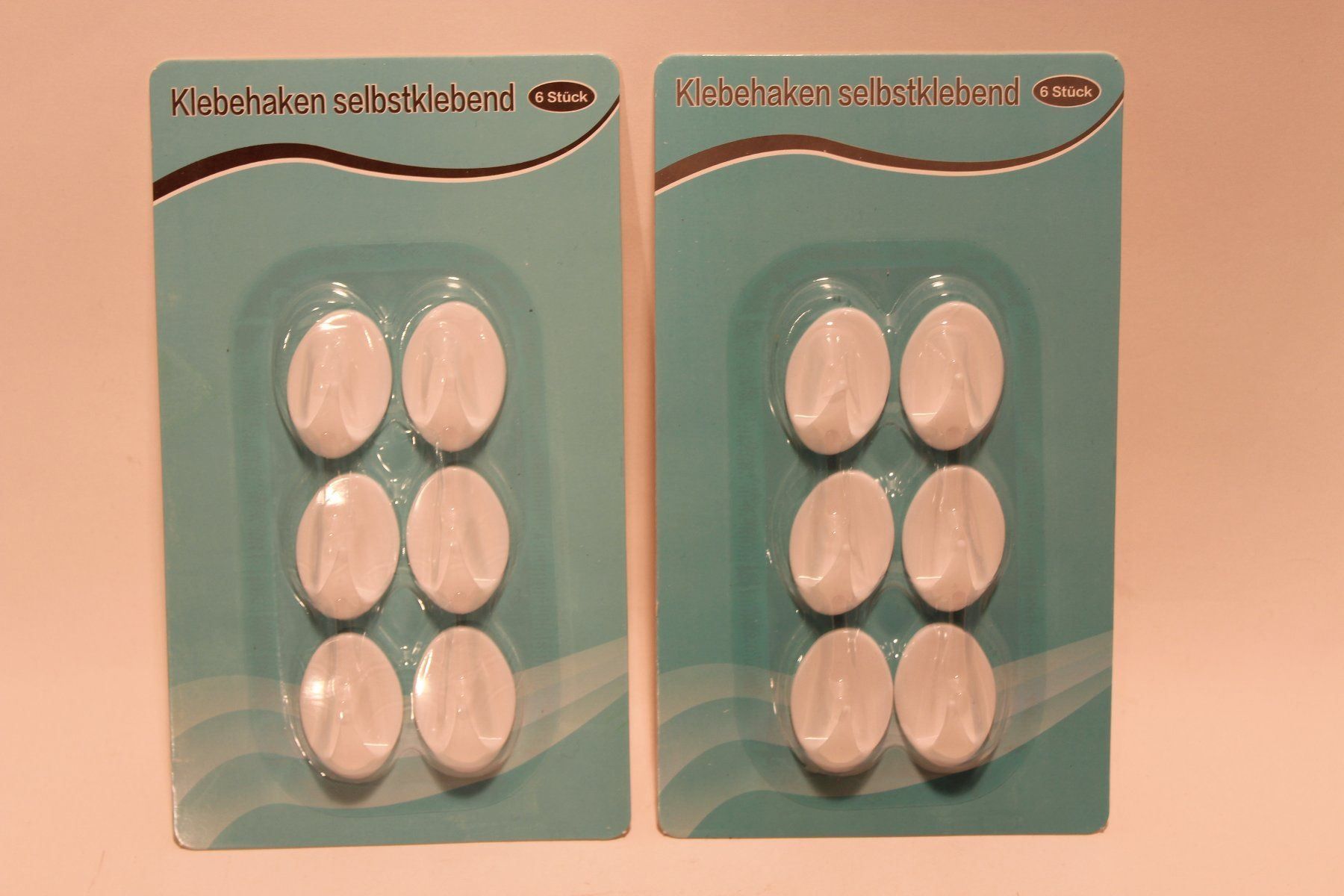 Eisenwaren: 12x Klebehaken, weiss – Neu und originalverpackt aus Fehraltorf von haefens