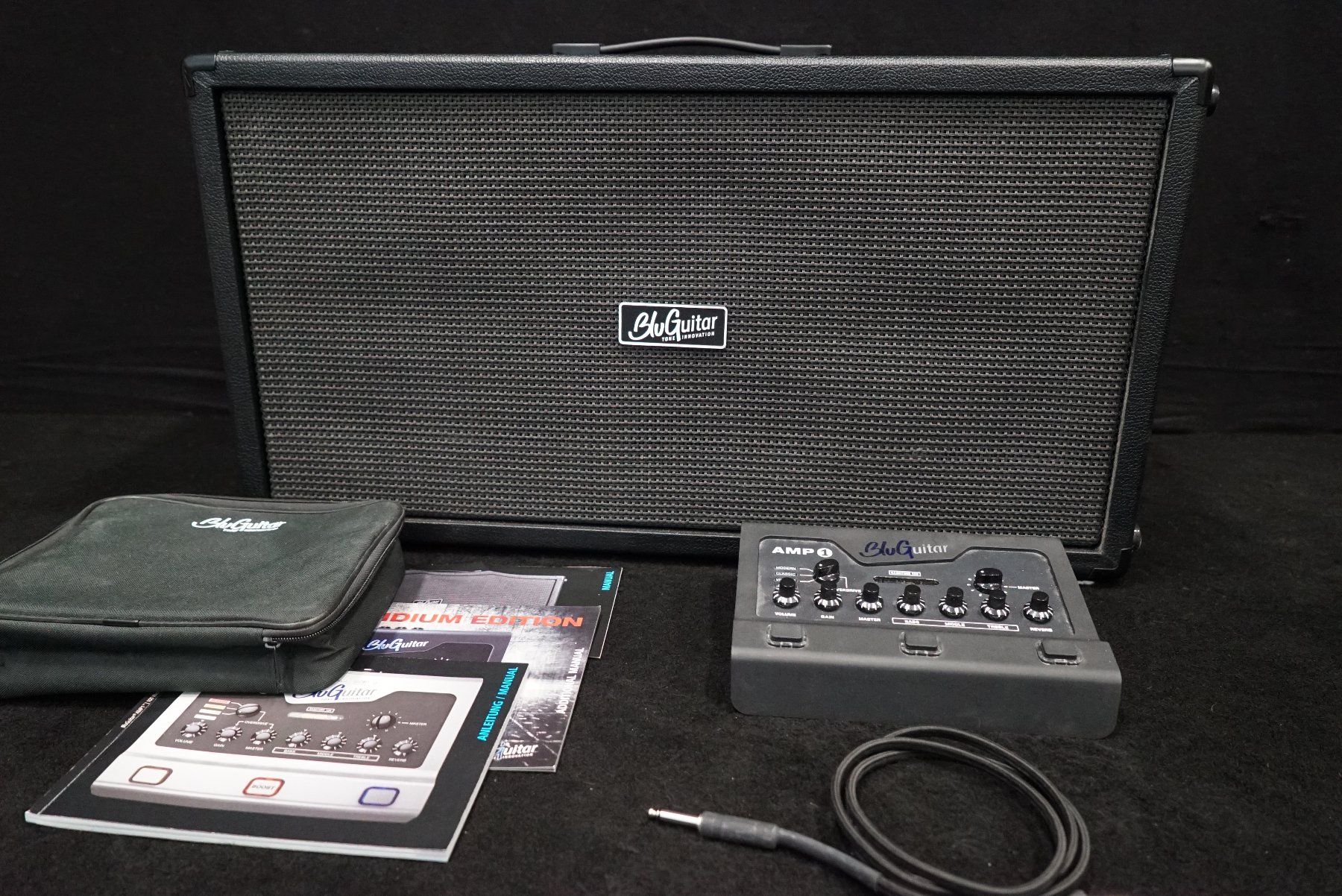 Amplificatori: BluGuitar AMP1 Iridium Edition & Bluguitar TwinCab 2x12" – Usato da Ortschwaben venduto da Musictrade