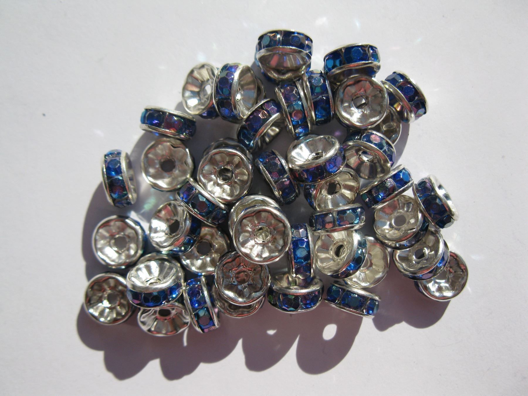 Perle (finte): 20 Strass Rondellen dunkelblau AB, 8mm – Nuovo e nell'imballaggio originale da St. Margarethen TG venduto da LuanaKa