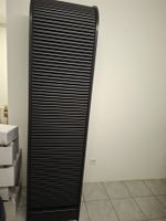 Schrank mit Rolladen