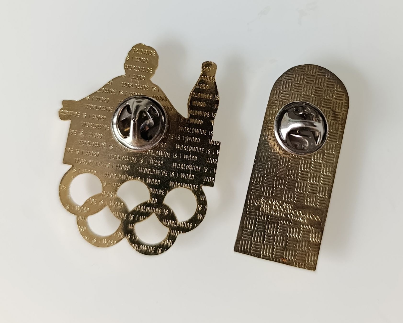 Coca-Cola Plaketten & Abzeichen: 2 Coca Cola Pins, Olympia – Gebraucht aus Wil SG von Donaldus 1