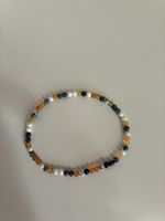 Armband mit verschiedenen Steinen, ca. 17 cm Umfang
