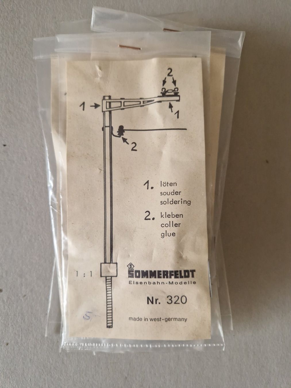 Sommerfeldt Modellini di ferrovie: Sommerfeldt Modellbahn Oberleitung H0 – Nuovo (secondo la descrizione) da Goldau venduto da Helipilot 2
