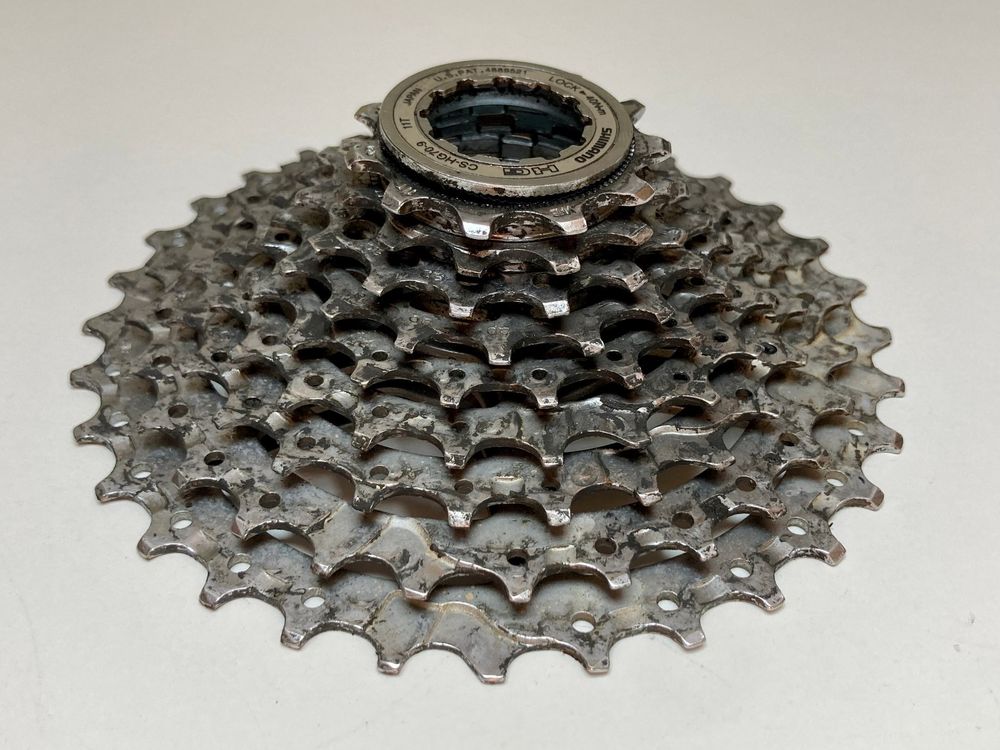 Cassette Shimano CS-HG70-9 9 Vitesses 11-34t - VTT/Touring - Quasi Neuve