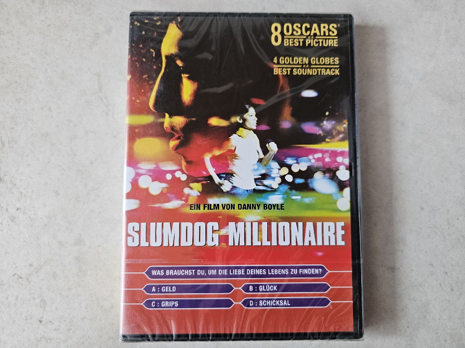 Tutti i DVDs: Slumdog Millionaire  /  Fabrikneu – Nuovo e nell'imballaggio originale da Schneisingen venduto da backstore24