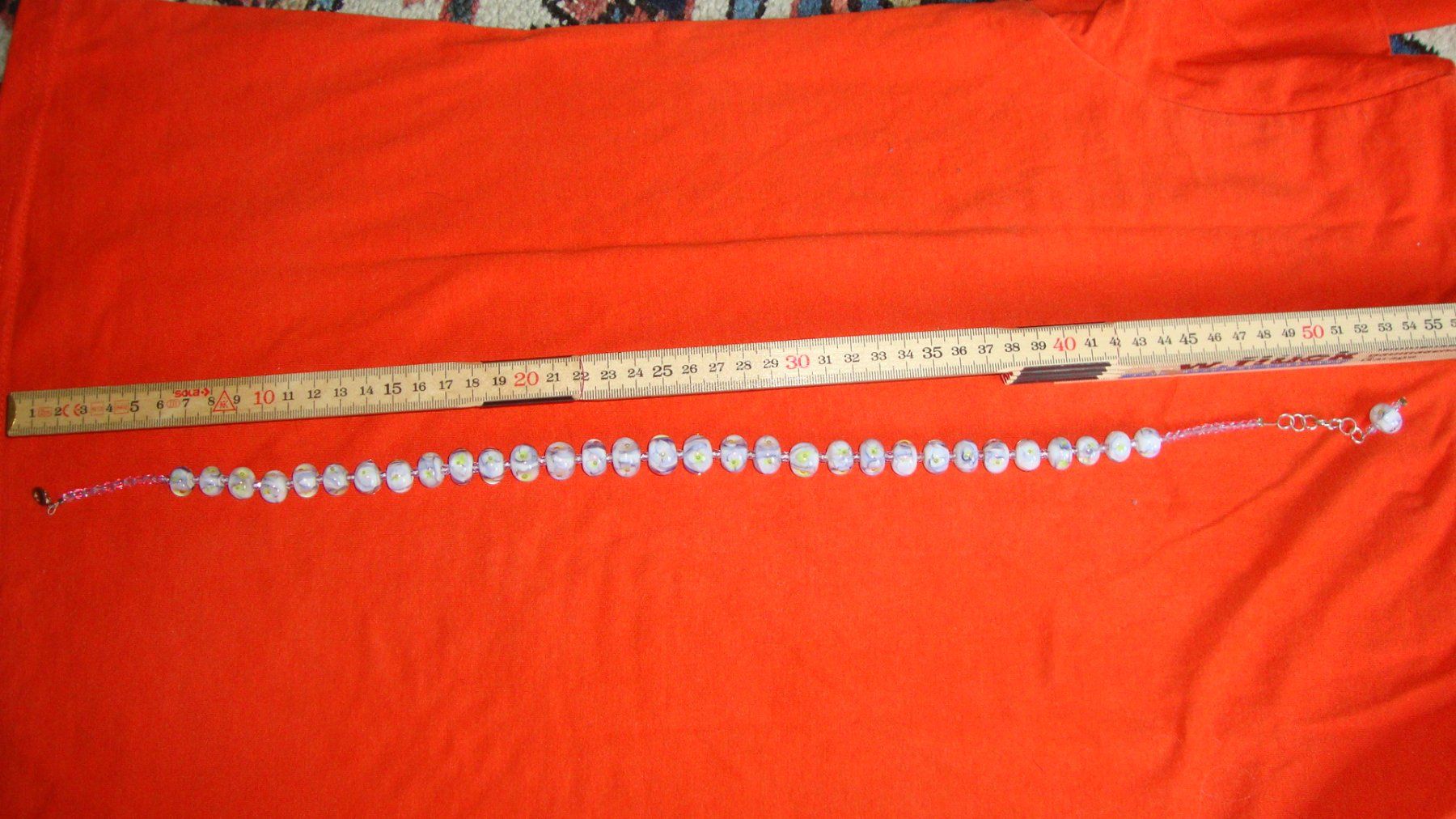 Catenine: Glaskette weiss mit Blumenmuster – Usato da Laufen venduto da ereli 3