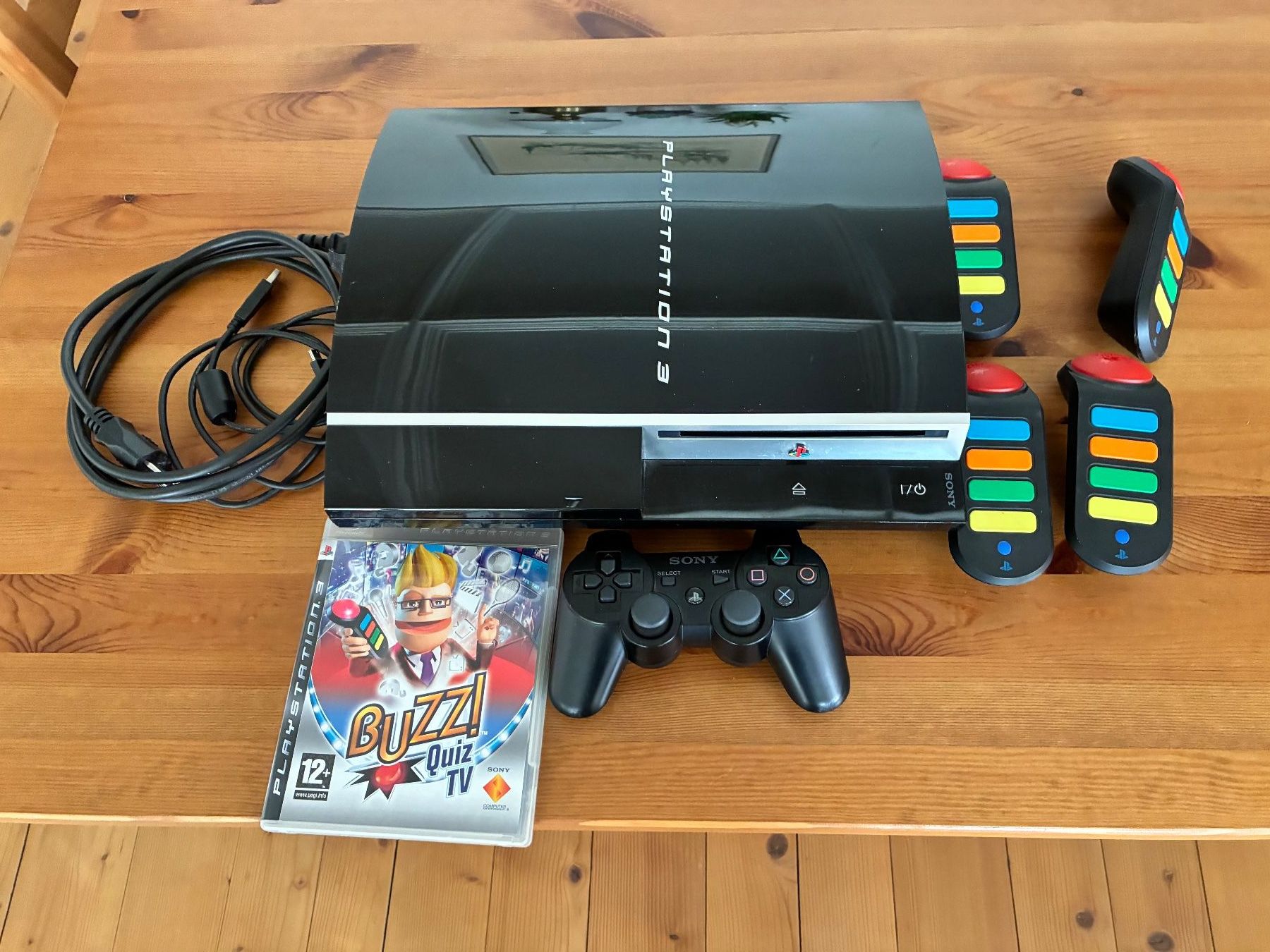 Sony Konsolen: Sony PlayStation 3 Konsole mit Buzz Controller Spiel – Defekt aus Bad Zurzach von waltia