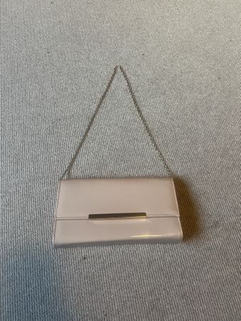 Rosa Clutch mit verstellbarer Henkel