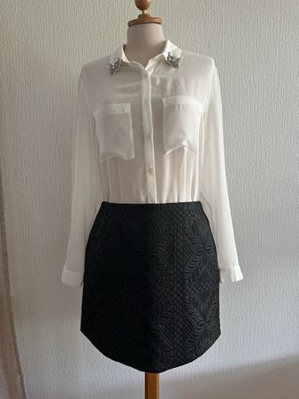 Mini Jupe Naf Naf noire taille 38 bon état