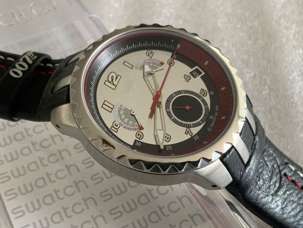 Swatch Montres: Swatch Irony Retrograde 007 MAX ZORIN ★ ungetragen – Neuf avec emballage d'origine à Wettswil par rotonda 1