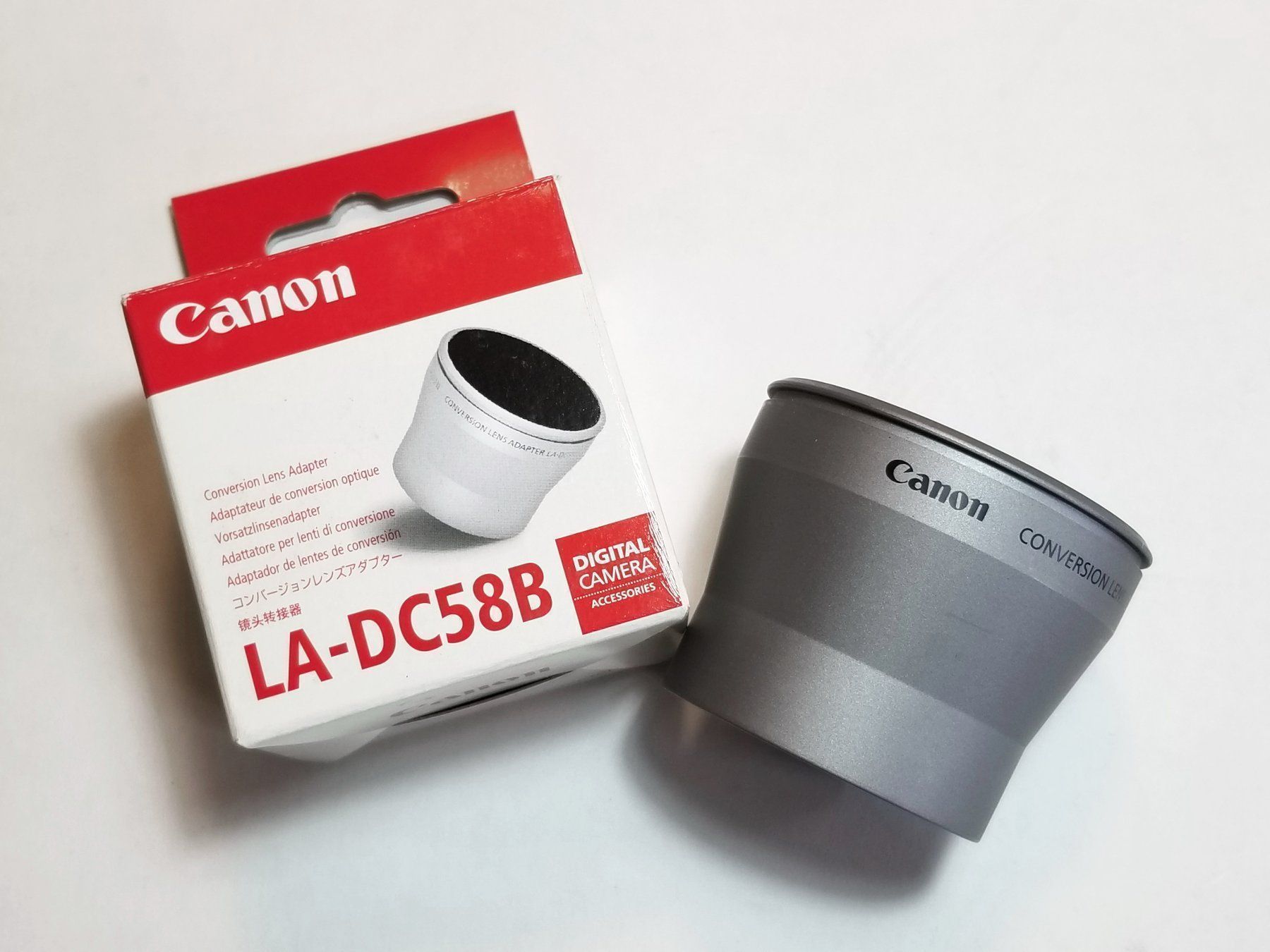 Canon Adattatori foto: Canon Vorsatzlinsenadapter LA-DC58B – Nuovo e nell'imballaggio originale da Schwerzenbach venduto da vimo-18 1