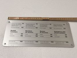 Schild Notfallnummern Auskunft und Devisenkurse Aluminium 40