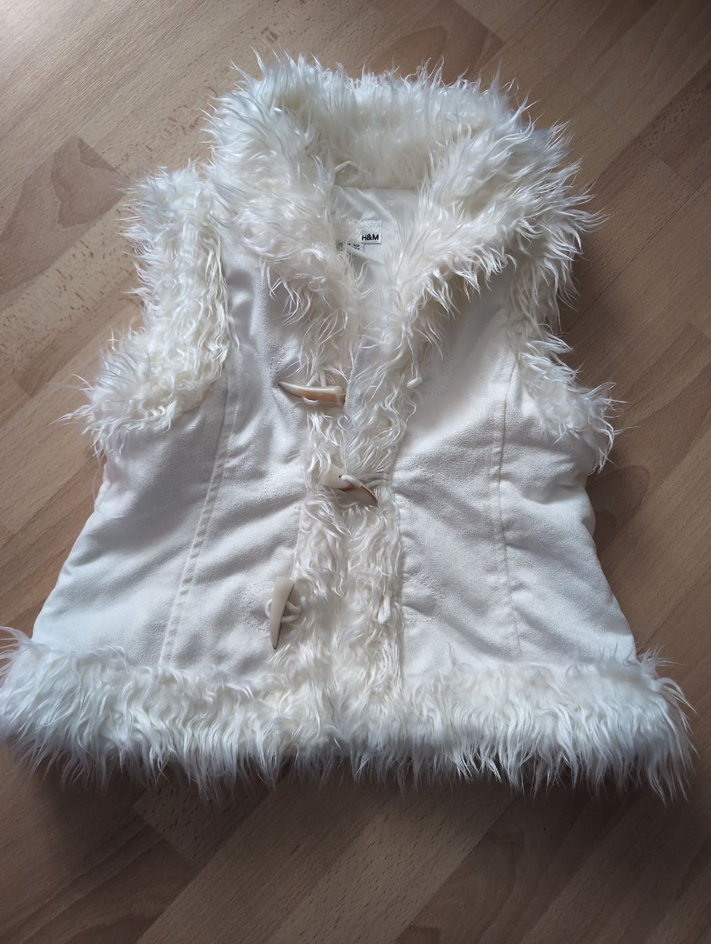 H&M Giacche & Cappotti: H&M Weste Mädchen Gr. 122 weiss – Usato da Unterägeri venduto da Fiobi