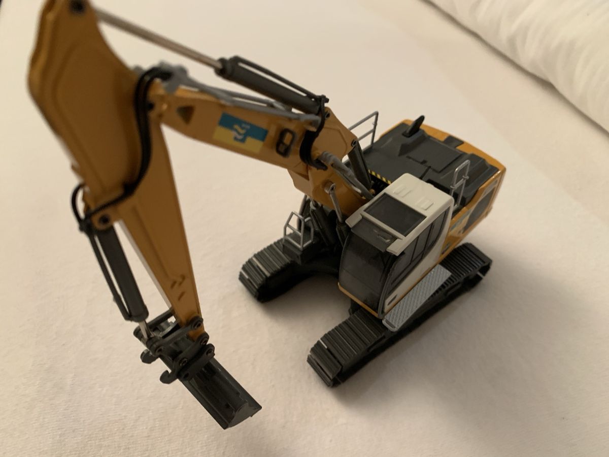 Liebherr Escavatori: Liebherr R 922 V Eberhard NEU! – Nuovo e nell'imballaggio originale da Birmenstorf AG venduto da Fhauri 2