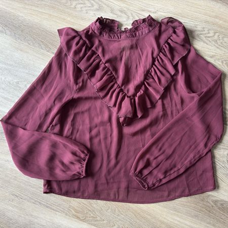 Camicetta bordeaux con volant maniche lunghe