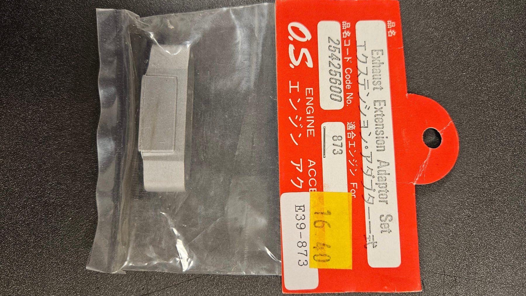 Motori: O.S. Engine Exhaust Extension Adapter Set, Code 873 52 – Nuovo e nell'imballaggio originale da Vaduz venduto da Lipet
