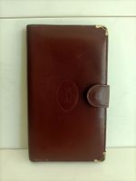 Porte-monnaie / Porte-feuille Must de Cartier cuir rouge