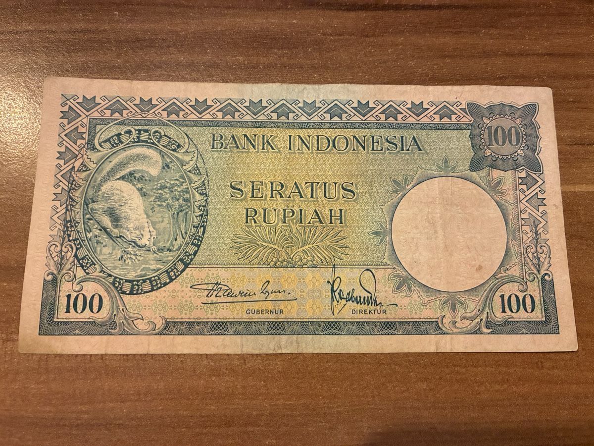Banconote: Indonesia 100 Rupiah, 1957 – Usato da Dällikon venduto da Woldbanknoten