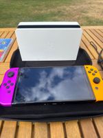 Nintendo Switch Konsole OLED mit Spielen und Zubehör