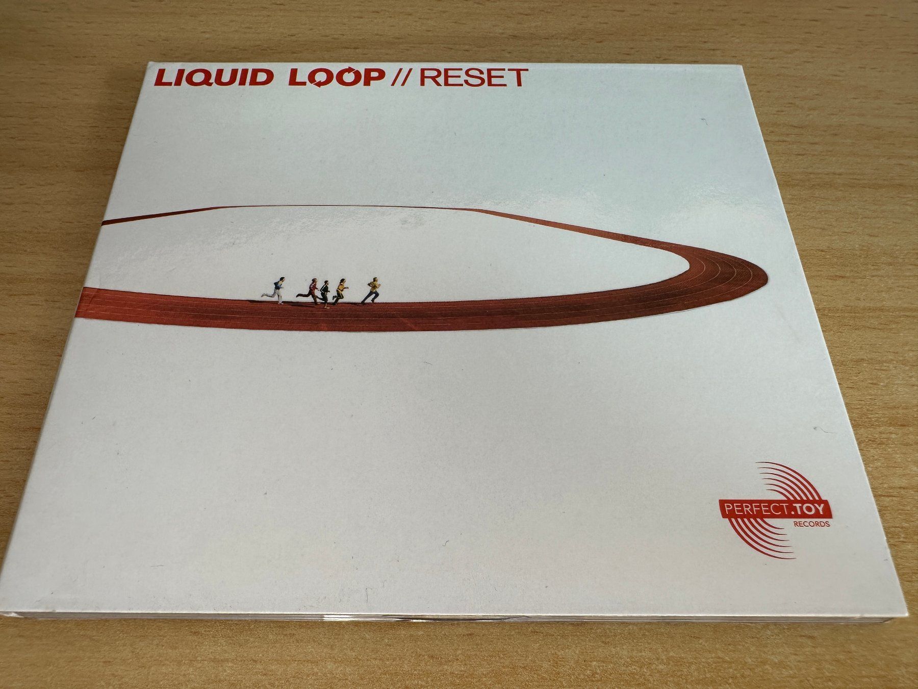 CDs: Liquid Loop – Reset – Gebraucht aus Rikon im Tösstal von Alpenmutz