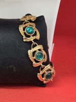Armband Goldfarben mit gruenen Steinen guter Zustand